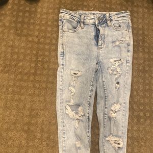super cute light was ripped jeans